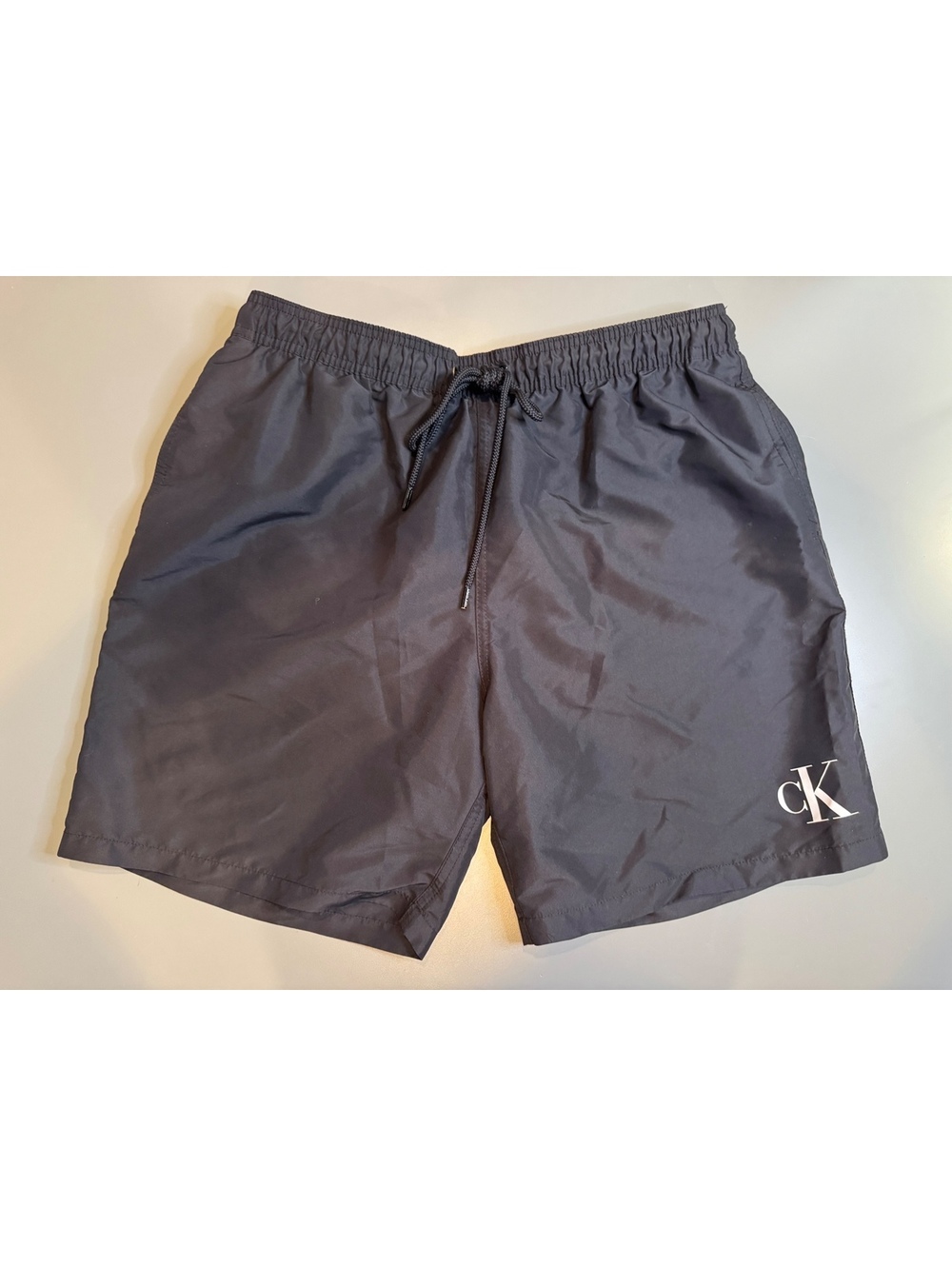 Calvin Klein Men's Black Swim Trunks with Logo Detail, Size XL